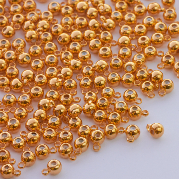 Zapięcie stoper z silikonem do cienkich sznureczków złote kulki z krawatką 6x4mm