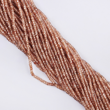 Cyrkonia oponka fasetowana 3x2mm beżowa Cyrkonia oponka fasetowana 3x2mm beżowa