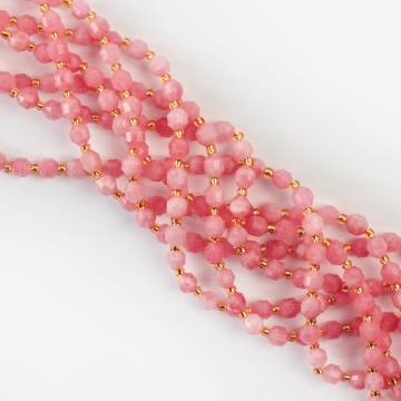 Rodochrozyt syntetyczny baryłka fasetowana 6mm