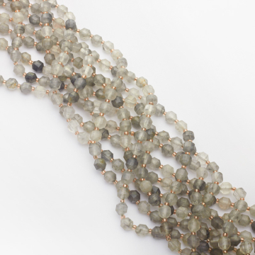 Kryształ górski szary baryłka fasetowana 6,5mm