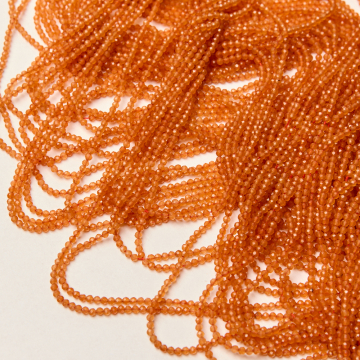 Jadeit pomarańczowy kulka fasetowana 2mm