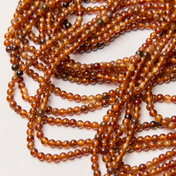 Granat pomarańczowy kulka gładka 4mm