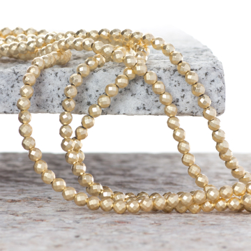 Hematyt platerowany kulka fasetowana light gold satine 4mm