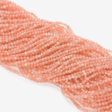 Kamień słoneczny kulka fasetowana pastelowo pomarańczowa 2.5mm