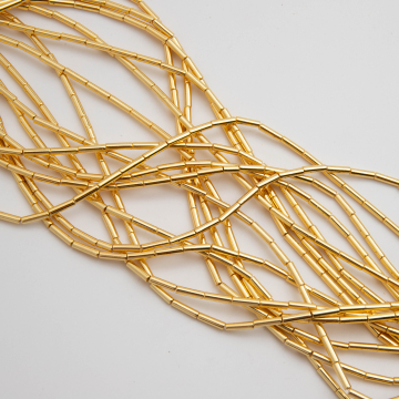 Hematyt słupek light gold 8x2mm