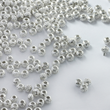 Metalowy koralik w korpeczki 4,5mm