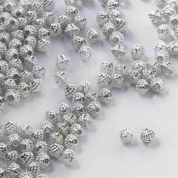 Metalowy koralik ufo w kropeczki 5,5mm