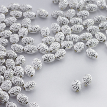 Metalowy koralik owal we wzorki 8mm