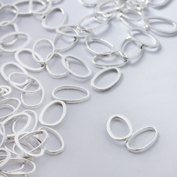 Łącznik metalowy owal błyszczący 12x7mm