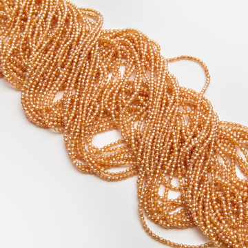 Kryształki kulki fasetowane shampagne AB 2mm