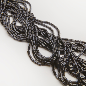 Kryształki słupki fasetowane jet 4,5x8,5mm