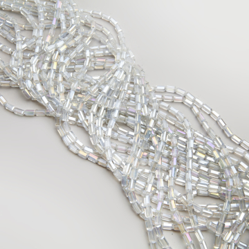 Kryształki słupki fasetowane crystal AB 4,5x8,5mm