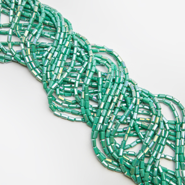 Kryształki słupki fasetowane turquise AB 4,5x8,5mm