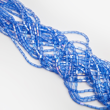 Kryształki słupki fasetowane blue topaz AB 4,5x8,5mm