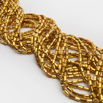 Kryształki słupki fasetowane old gold 4,5x8,5mm