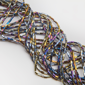 Kryształki słupki fasetowane jet AB 2,5x4,5mm