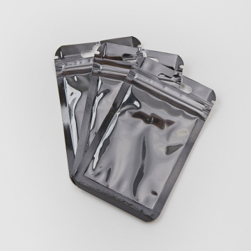 Woreczek z zamknięciem strunowym z czarnym tłem 10x6cm