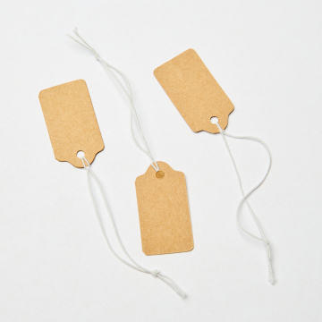 Metka z gumką do bizuterii brązowa 18x33mm