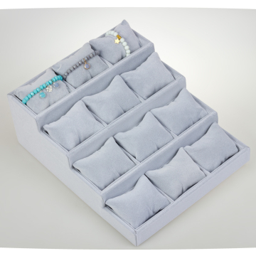 Ekspozytor schodkowy z poduszkami 12 komorowy szary 29x35cm Ekspozytor schodkowy z poduszkami 12 komorowy szary 29x35cm