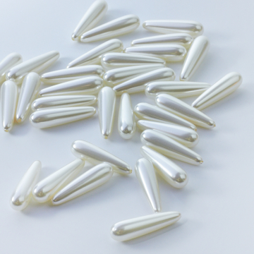 Perły ceramiczne łezka do kolczyków 30x8mm biała