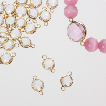 Przekładka w okuciu w złotym kolorze z dwoma oczkami crystal 8mm