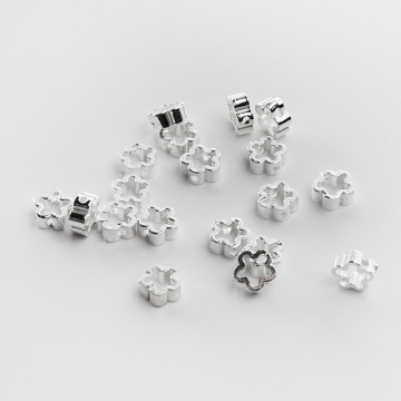 Srebrny koralik kwiatek wycięty AG925 5,5x6mm