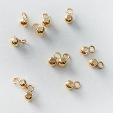 Srebrny stoper z silikonem i podwieszeniem do cienkich sznureczków AG925 pozłacana 3mm