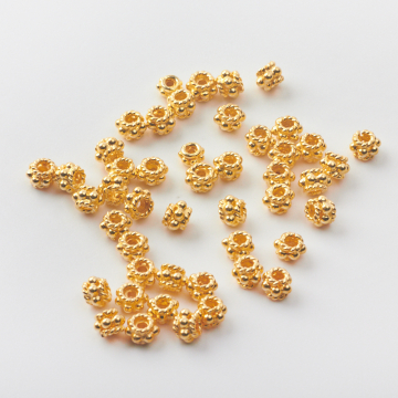 Srebrny koralik w kropeczki AG925 pozłacany 4,5mm