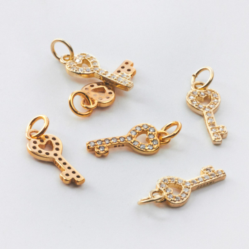 Srebrna zawieszka kluczyk z cyrkoniami AG925 pozłacany 15mm