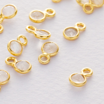 Kamień księżycowy krążek fasetowny zawieszka w okuciu pozłacanym AG925 4mm