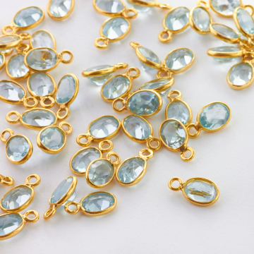 Topaz błękitny owal fasetowany w okuciu zawieszka AG925 6,5mm