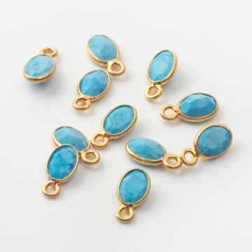 MAGnezyt owal fasetowany zawieszka w okuciu AG925 pozłacana 4,5x6mm