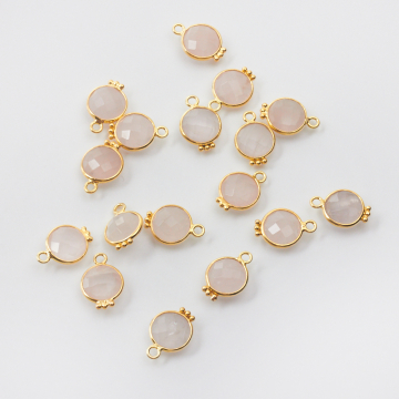 Kryształ górski różowy krążek w okuciu pozłacany 8mm