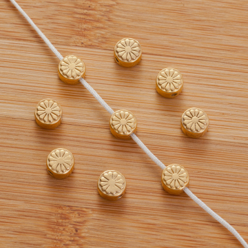 Srebrny koralik krążek kwiatek AG925 pzłacany 6.5mm