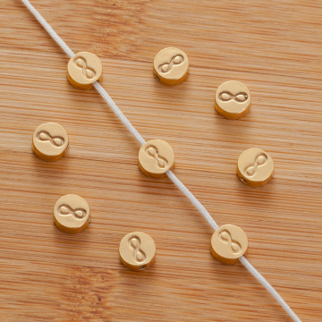 Srebrny koralik krążek nieskończoność AG925 pozłacany 6,5mm