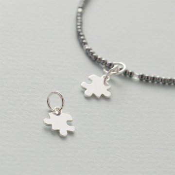 Srebrna zawieszka do bransoletek puzzel AG925 12x9,5mm