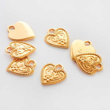 Srebrna zawieszka serce ze zdobieniami AG925 pozłacana 17mm