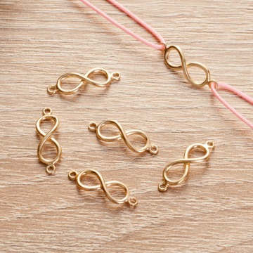 Srebrny łącznik nieskończoność AG925 pozłacany 18x5.5mm