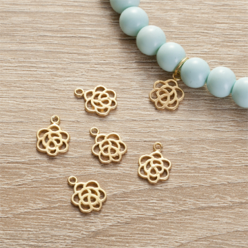 Srebrna zawieszka kwiatek AG925 pozłacana 9mm