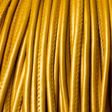 Rzemień szyty metallic gold 4mm Rzemień szyty metallic gold 4mm