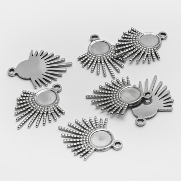 Zawieszka ze stali szlachetnej promienie słoneczne w kolorze srebrnym 26mm