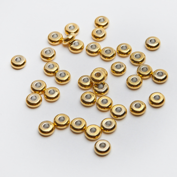 Przekładka krążek płaski ze stali chirurgicznej w kolorze złotym 6x2.5mm