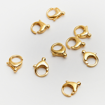 Karabiczyk ozdobny ze stali szlachetnej w kolorze złotym 12mm