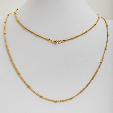 Łańcuszek ze stali chirurgicznej Bismarck z oponkami  w kolorze złotym 60cm