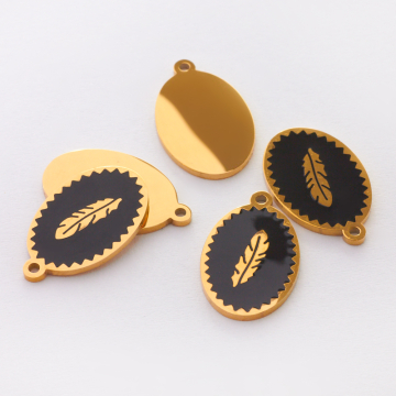 Zawieszka emaliowana owal ze stali chirurgicznej w kolorze złotym piórko czarne 17,7mm