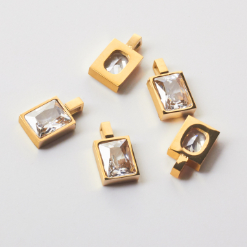 Zawieszka ze stali chirurgicznej prostokąt z cyrkonią crystal w kolorze złotym 9,5x7,5mm