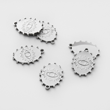 Zawieszka ze stali chirurgicznej grawerowana owal z wypustkami w kolorze srebrnym 18mm