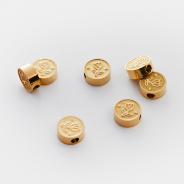 Koralik ze stali chirurgicznej z tulipanem w kolorze złotym 8mm PVD