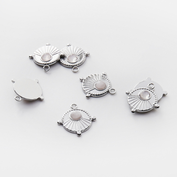 Zawieszka ze stali chirurgicznej kółko z wypustkami z różowym kryształem górskim w kolorze srebrnym 17,5mm