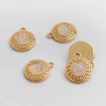 Zawieszka ze stali chirurgicznej kółko greckie kryształem górskim różowym w kolorze złotym 19mm PVD